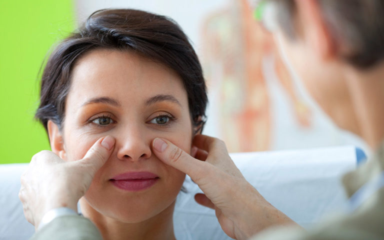 woman receiving bruxism treatment for headaches in San Francisco, CA