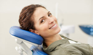 A San Francisco woman shows off perfect smile with dental veneers