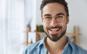 Smile male dental patient in San Francisco got composite fillings