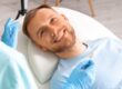 closeup of a young man smiling in a dental chair